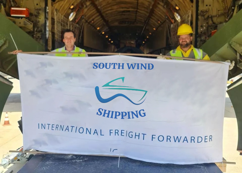 South Wind employees holding sign